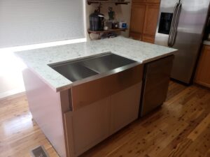 Completed island with farmhouse sink
