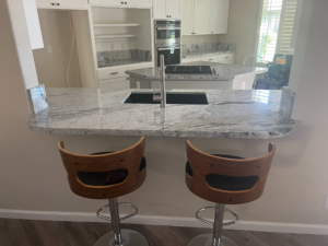 Custom Granite Fabrication & Installation with Pass Through Bar